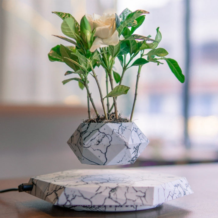 Air bonsai pot with levitating system and marble pattern for unique room decoration