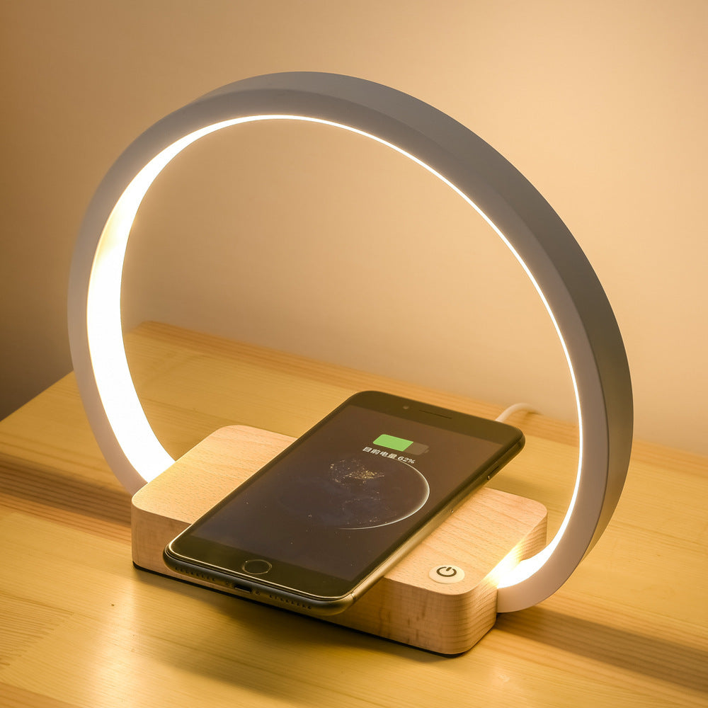 Multifunctional table lamp with built-in wireless charger and USB port for modern desk use