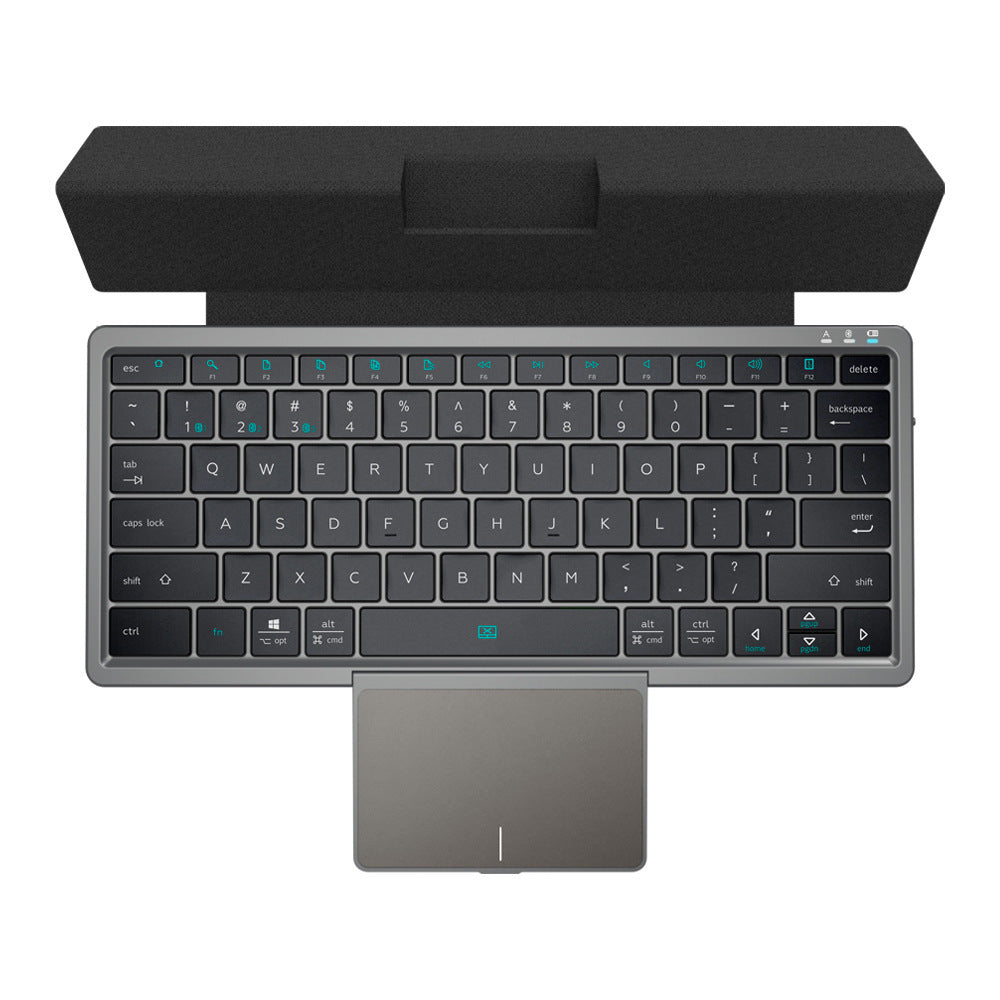 Portable wireless Bluetooth keyboard with built-in concealable touchpad, compact and sleek design for mobile and desktop use