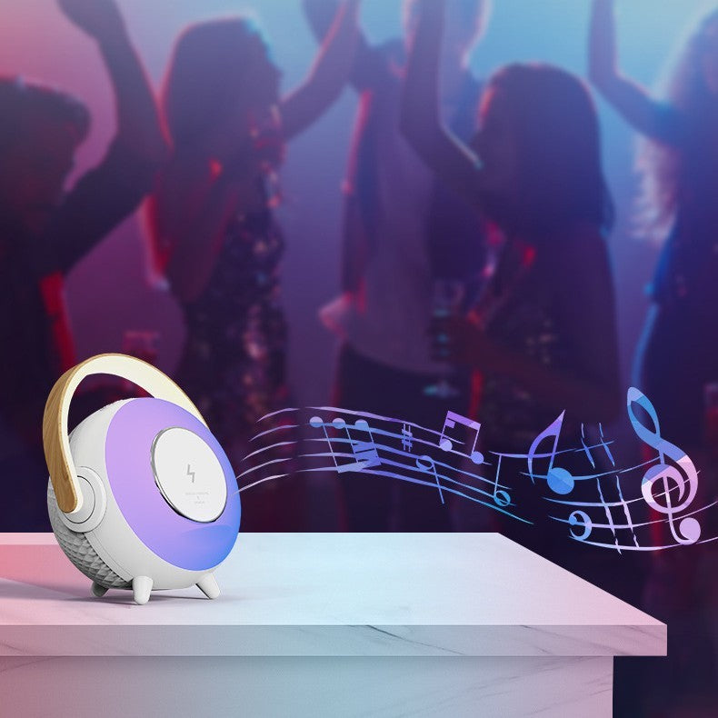 Bluetooth speaker with built-in wireless charger for on-the-go music and power