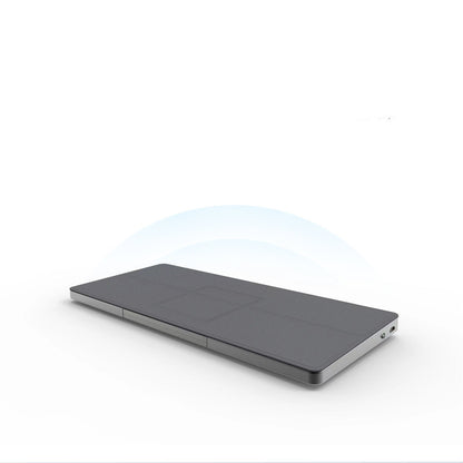 Portable wireless Bluetooth keyboard with built-in concealable touchpad, compact and sleek design for mobile and desktop use