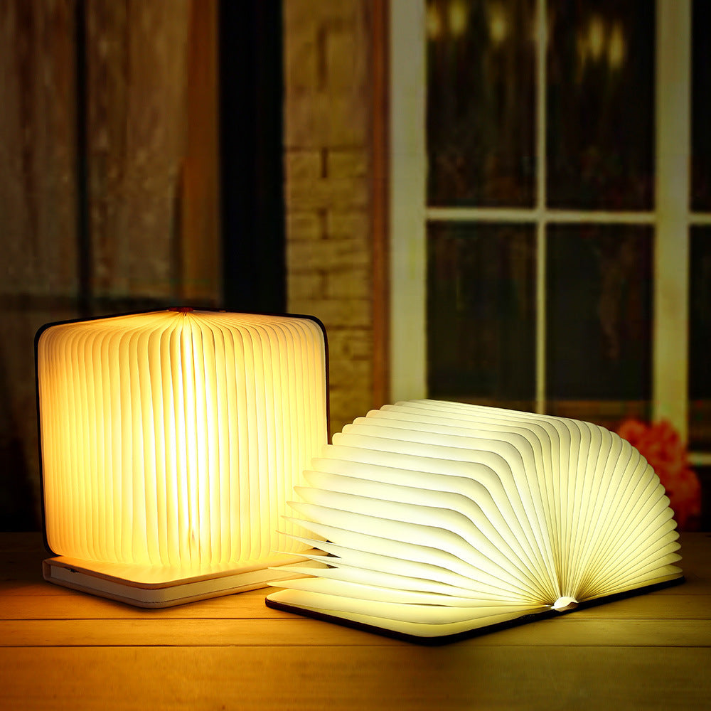 Bedside reading lamp with folding body and rechargeable power for bedroom use
